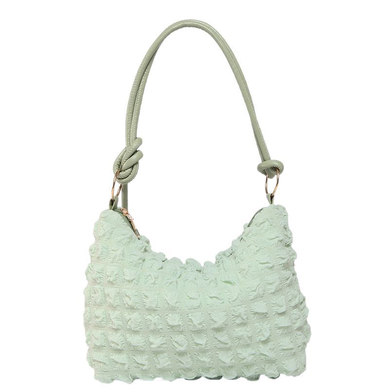 Bolso de moda simple y suave para mujeres, bolso de brazalete para mujeres, verano 2025, nuevo bolso de hombro universal.