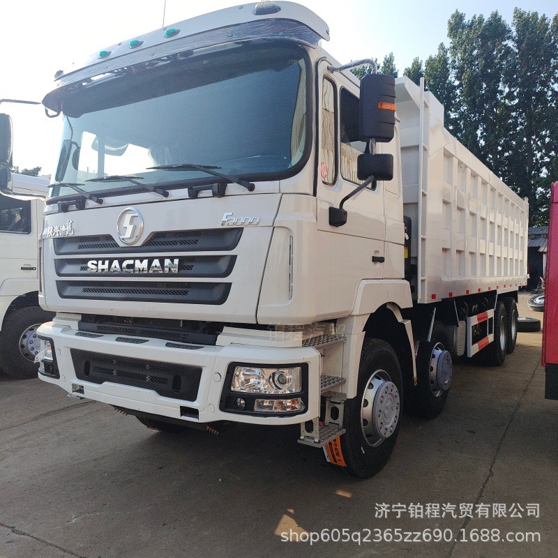 Cross-border sale of Shaanqi Delong front-four-wheel-rear-eight-wheel dump trucks, engineering box-type self-unloading tractor heads for mining and soil transport