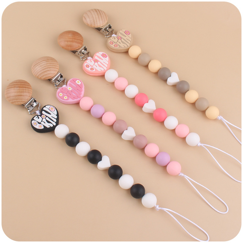 Nuevo bebé de dibujos animados amor mordedor bebé creativo DIY Pequeño amor de silicona mordedura Cadena de pezón cadena anti-caída