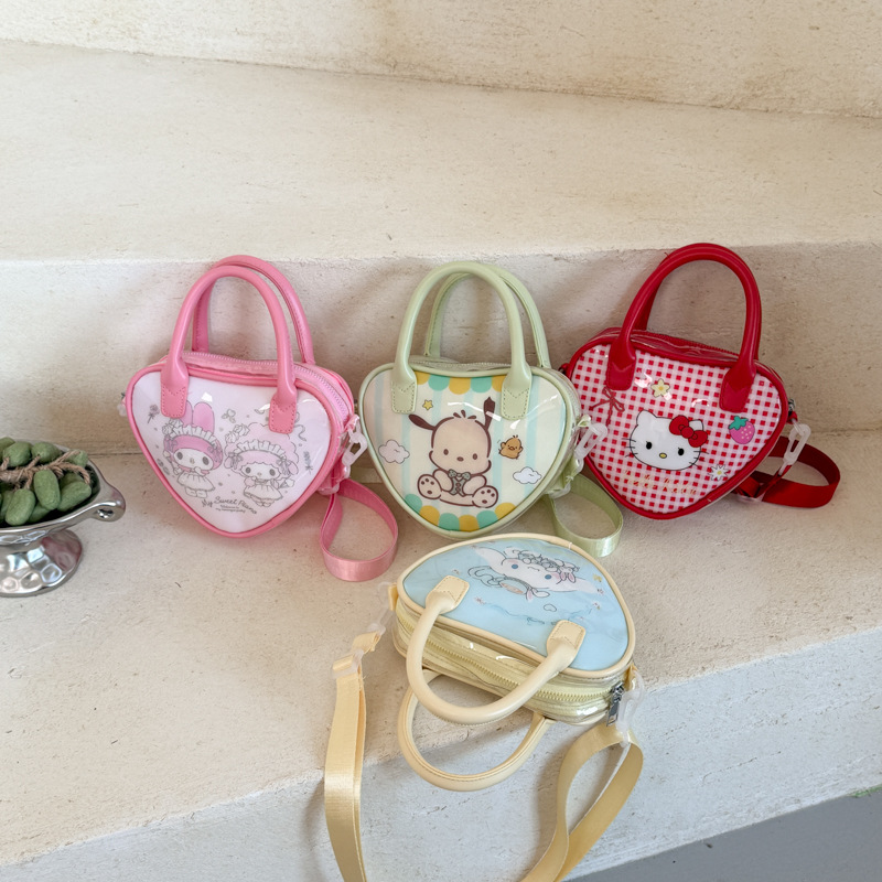 Sanrio's new children's PVC crossbody bag, featuring a cute cartoon cat design, is a small, adorable mini shoulder bag perfect for girls and as a matching parent-child bag
