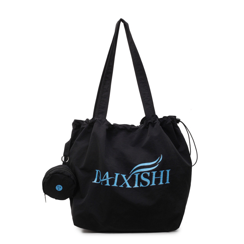 Bolso de estilo perezoso para mujer de gran capacidad 2025 nuevo bolso de lona coreano bolso de mujer de viaje ligero de ocio