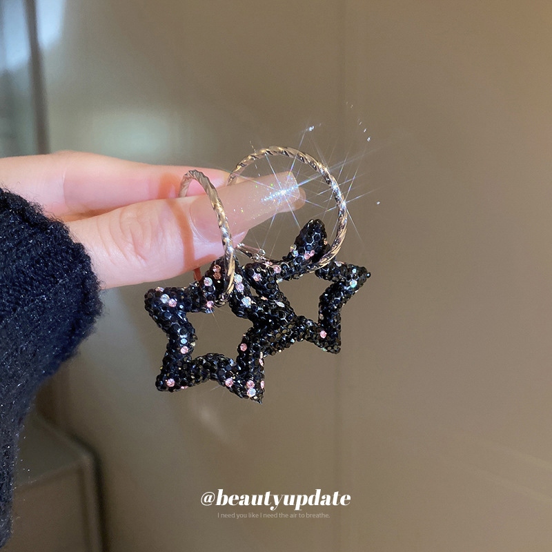 Aguja de plata diamante estrella hueco círculo pendientes chica caliente dulce fresco estilo pendientes nicho personalizado diseño pendientes al por mayor