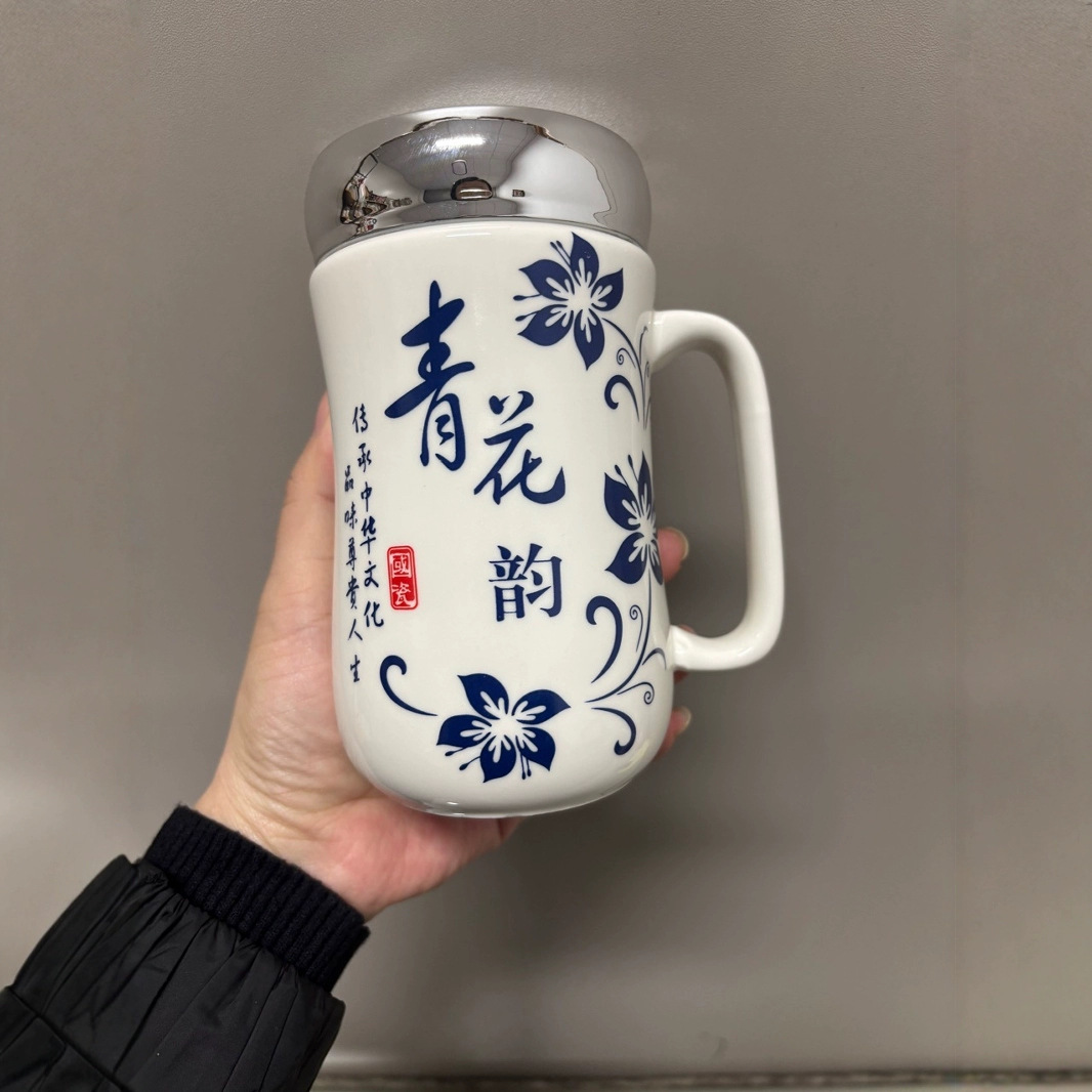 Taza de cara con espejo de rima azul y blanco Taza de cerámica al por mayor para el cabello Taza de agua potable de alto valor para el hogar Cerámica para estudiantes de dibujos animados