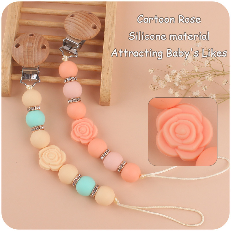 Nuevo bebé de dibujos animados de doble cara Rosa mordedor creativo DIY flash cuentas de ladrillo silicona mordedura pezón cadena anti-caída
