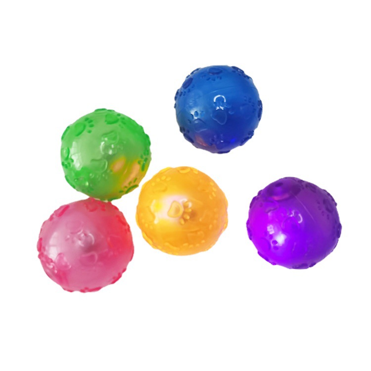 Mascota juguete huellas de bola huellas luminosa bola elástica perro interactivo resistente a la mordedura molar TPR diente limpieza juguete ventas directas de la fábrica