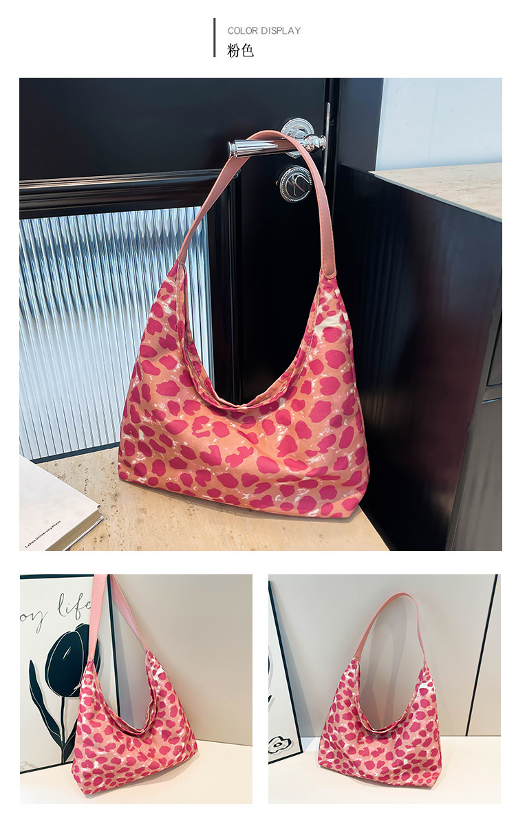 A new minimalist canvas bag with a large capacity in Korean fashion, a leopard print commuter single-shoulder crossbody bag undefined