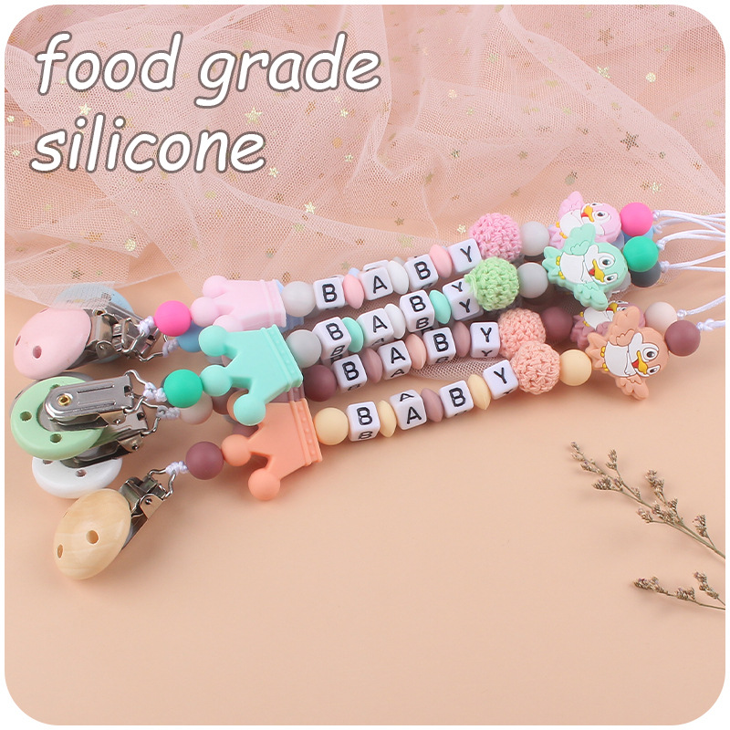 Nuevo bebé suministros de silicona chupete cadena de dibujos animados animal pájaro silicona mordedura pegamento cadena molar cadena anti-gota