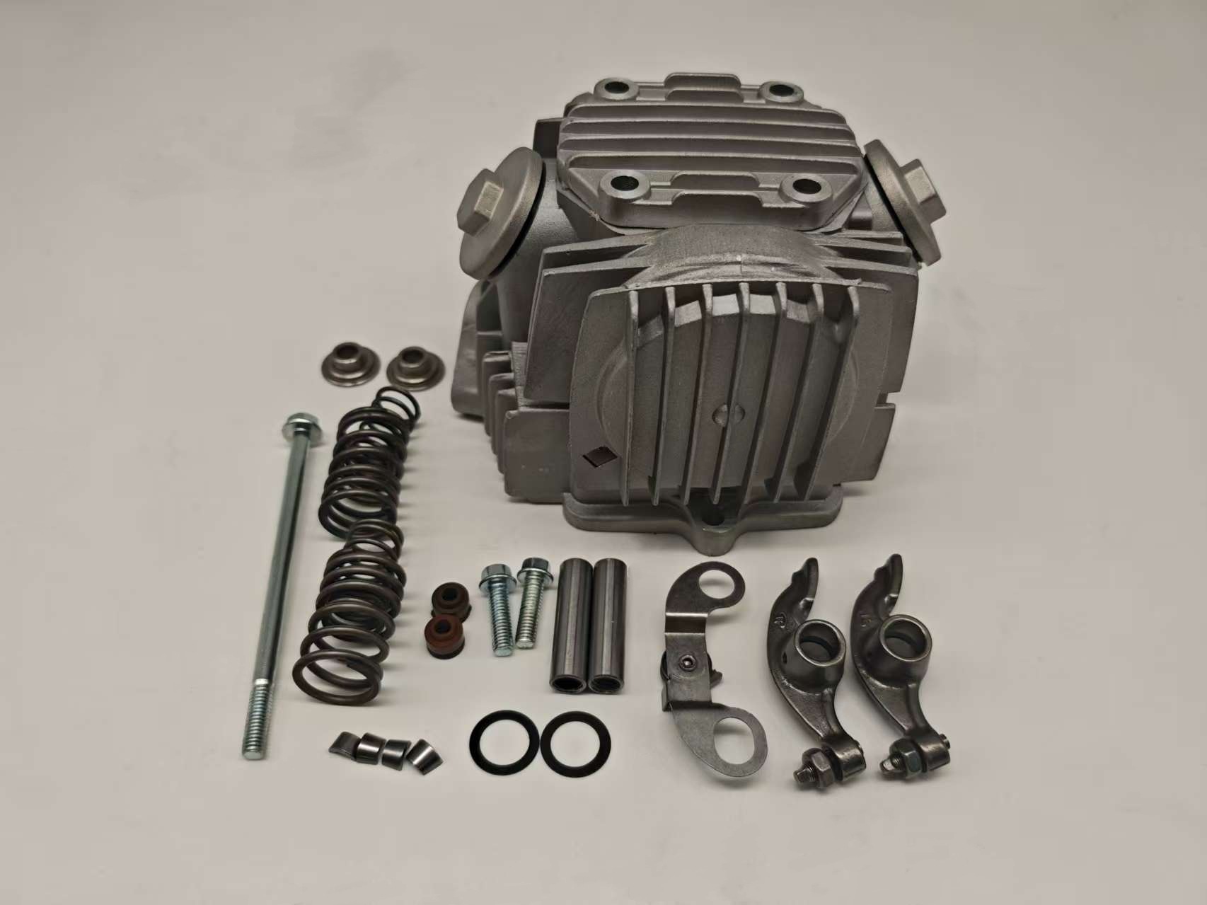 This T WAVE100 European cylinder head assembly is for the NF100 scooter, an OHC chain engine cylinder head component