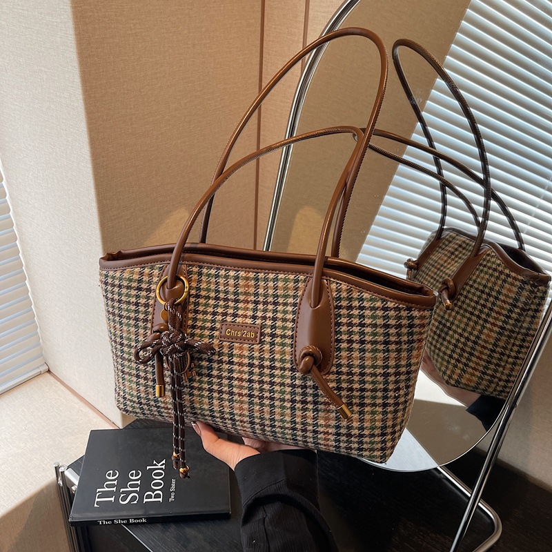 Coreano 1000 pájaros estilo extranjero hombro brazo bolso de viaje de gran capacidad para mujeres 2025 nuevo bolso de moda