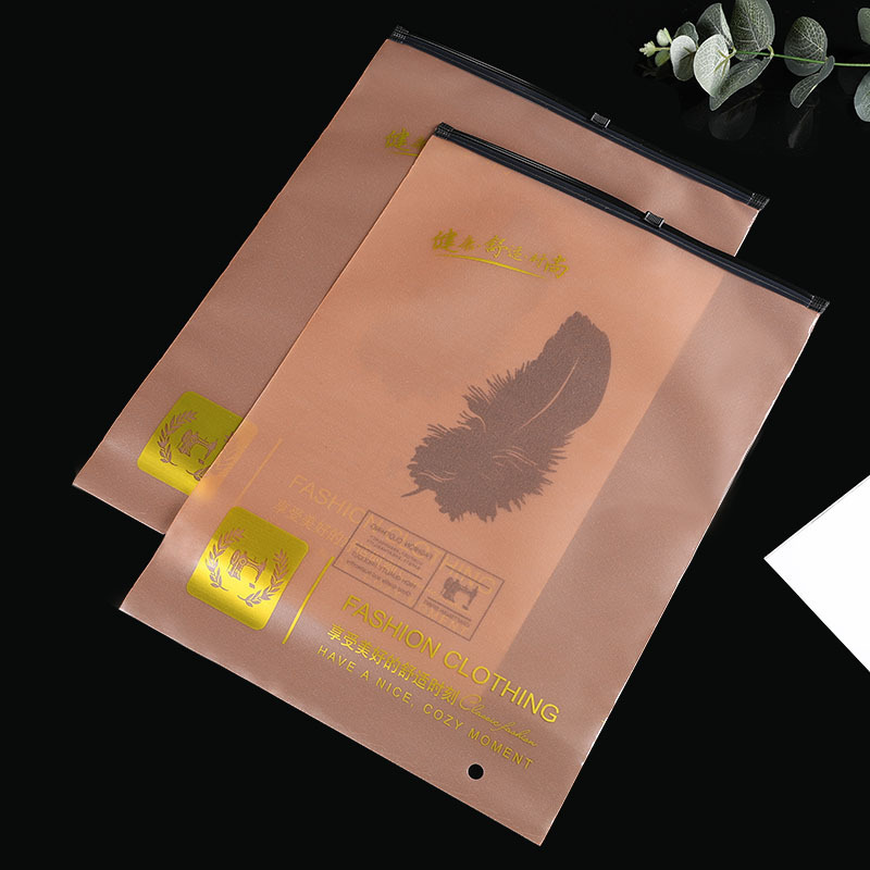 Bolsa con cremallera de ropa Bolsa con cremallera de crisantemo pequeño Bolsa de embalaje de camiseta Bolsa de ropa interior Bolsa de ropa PE esmerilada pequeña bolsa ziplock