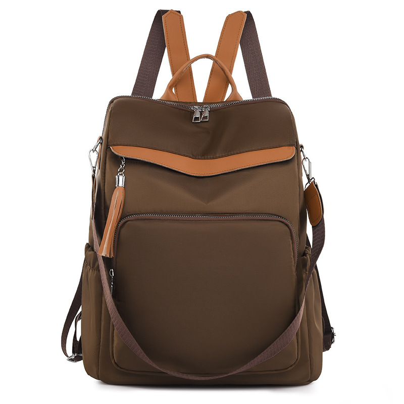 Comercio exterior al por mayor primavera nuevo estilo casual damas Oxford color contraste mochila simple y versátil multifuncional de doble uso