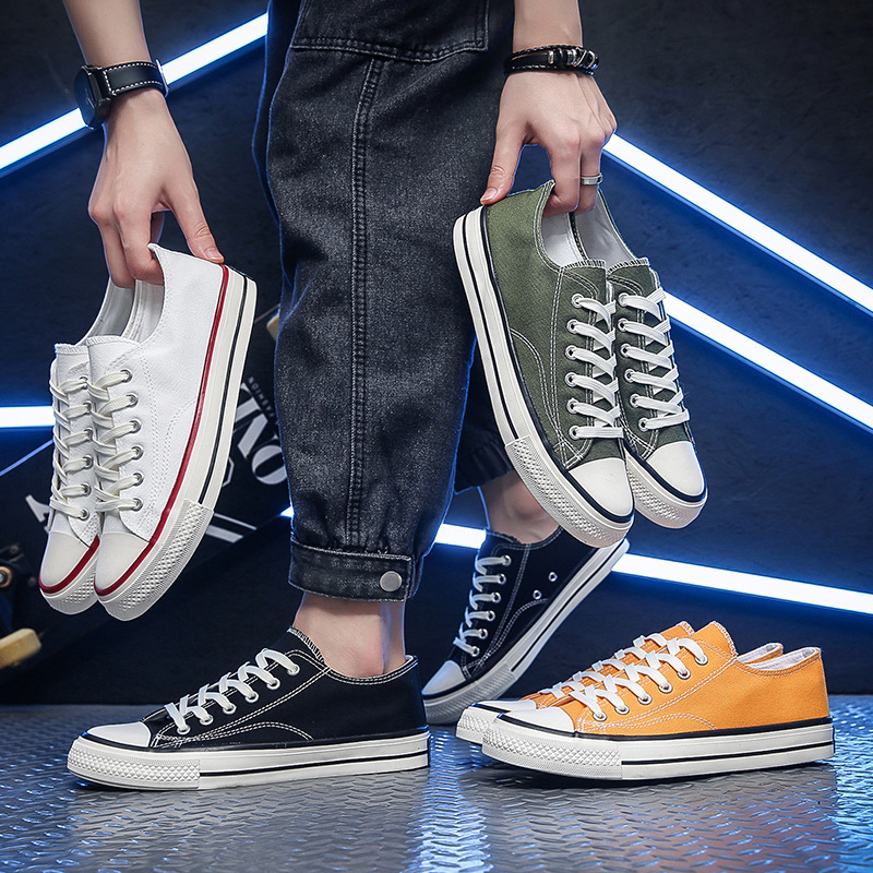 Zapatillas de lona a la moda 2025 para hombre, calzado casual para parejas, zapatillas juveniles, transpirables, suministro del fabricante, cómodas, de suela plana, versátiles.