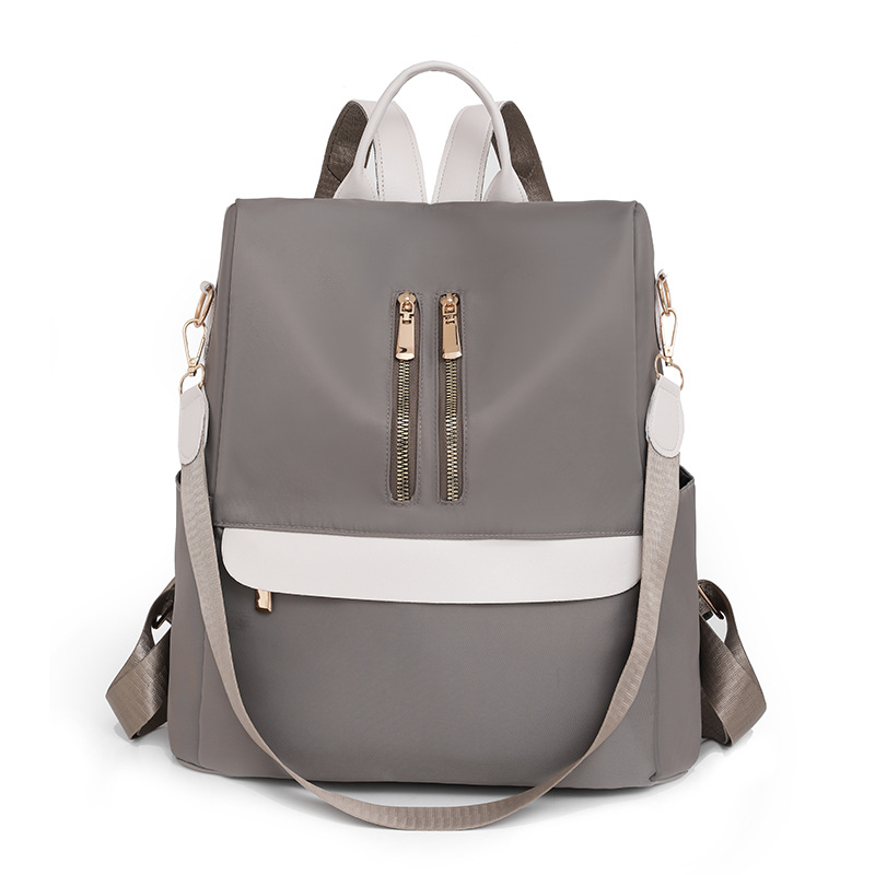 Comercio exterior al por mayor 2023 nueva mochila antirrobo de nailon para mujer casual tendencia de moda mochila de doble uso de gran capacidad