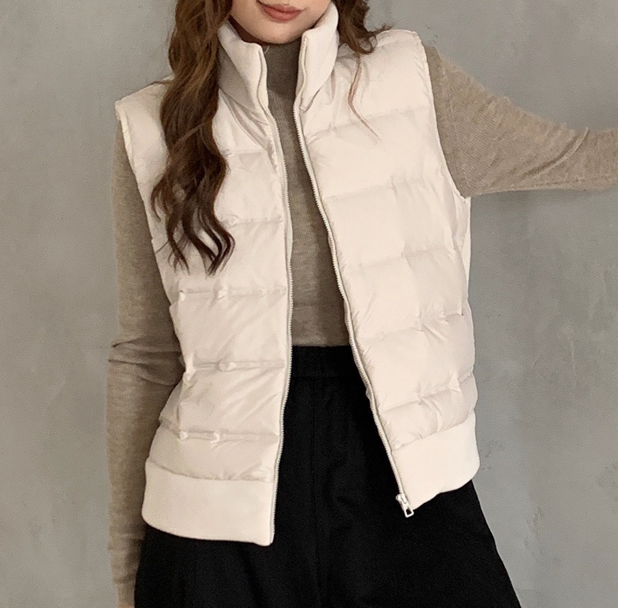 Finnafu nuevo chaleco de plumón de otoño y invierno de mujeres de alto nivel chaleco de chaqueta de arroz blanco caliente para usar una camisa universal