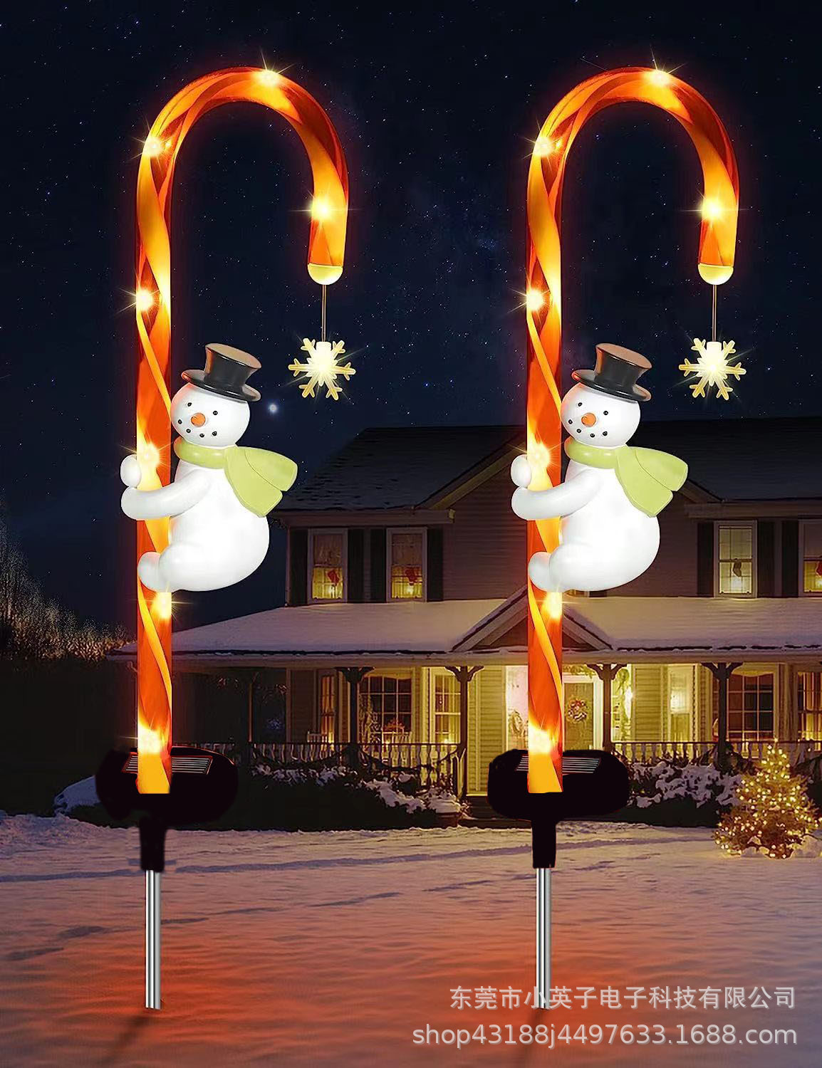 Dos luces de bastón de muñeco de nieve