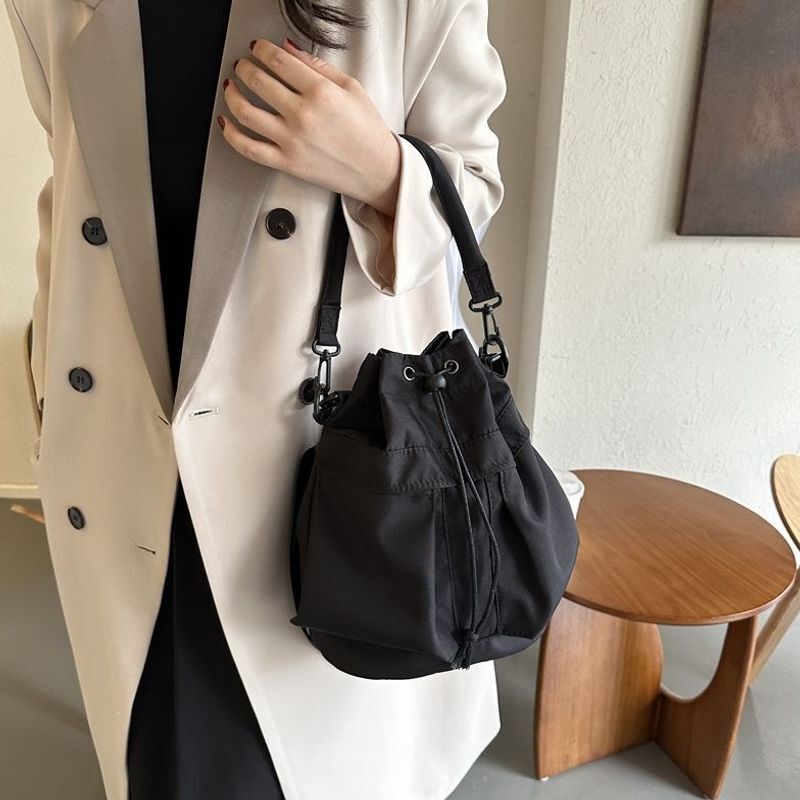 Korean-style 2026 fashion women's bag, nylon drawstring bucket bag, unique and versatile, handbag, shoulder bag, crossbody bag, casual