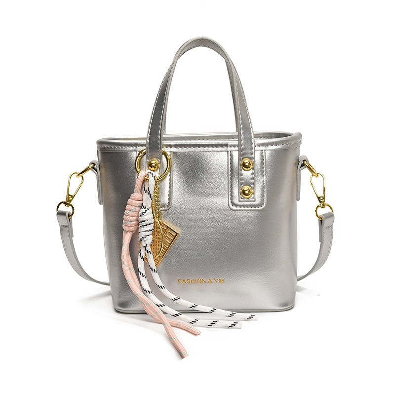 Bolso de cubo de mano para mujer 2025 nuevo estilo de comercio exterior casual bolso de hombro simple casual de viaje casual bolso de mensajero de alta calidad