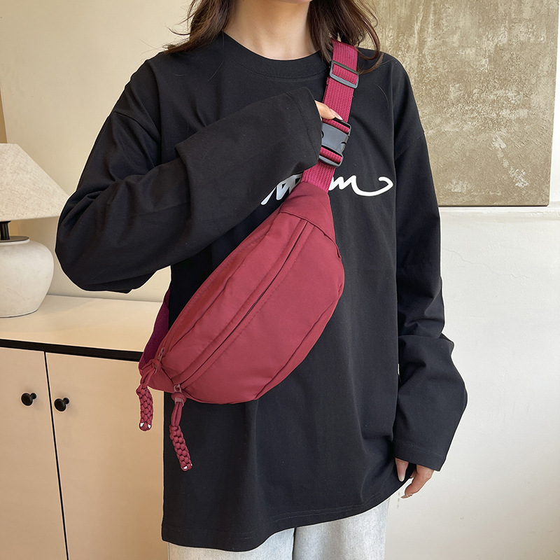 Bolso de pecho deportivo de moda japonés para mujeres 2026 estilo coreano versátil bolso de cintura para teléfonos móviles casuales simple bolso de mochila