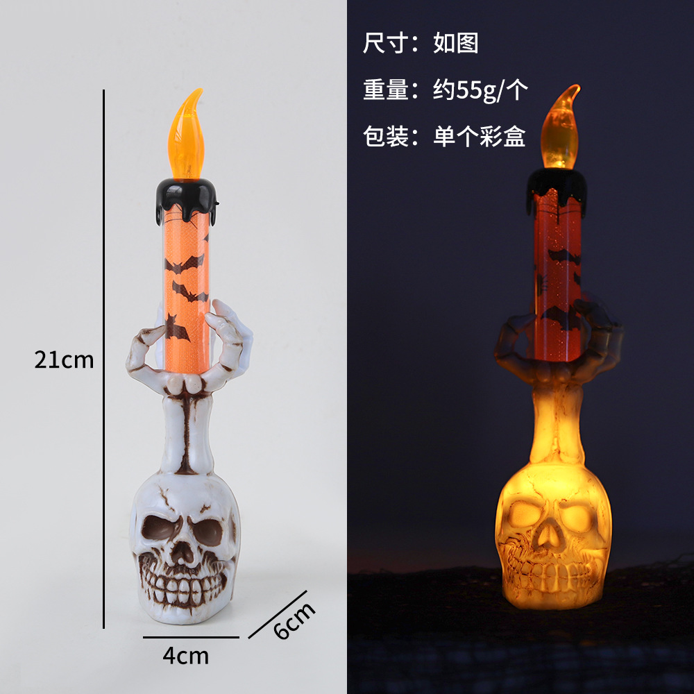 Cráneo grande con luz naranja naranja de mano