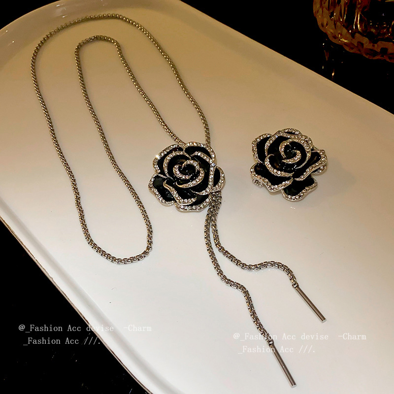 Camellia zircon oil drop brooch new niche personality high sense corsage European and American temperament Joker jewelry wholesale