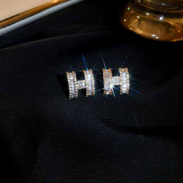 Golden silver needle with letters