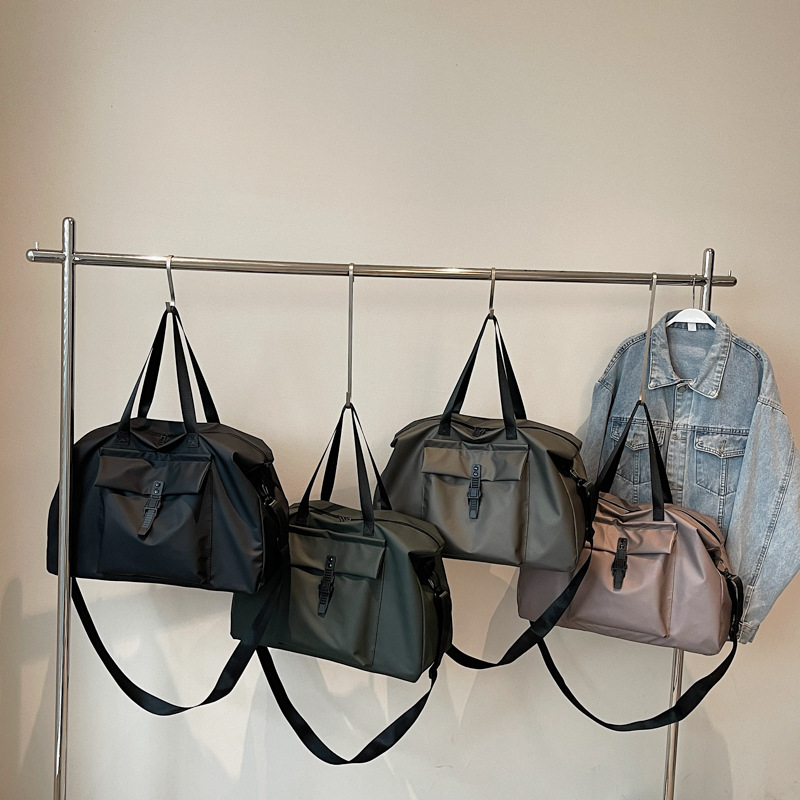 Bolsa de viaje transfronteriza de gran capacidad para mujeres nueva bolsa de almacenamiento portátil deportivo de acondicionamiento físico bolsa de viaje de negocios