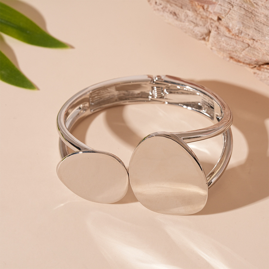 Pulsera de apertura geométrica irregular metálica europea y americana, personalidad exagerada, temperamento de nicho simple, joyería de alta gama femenina