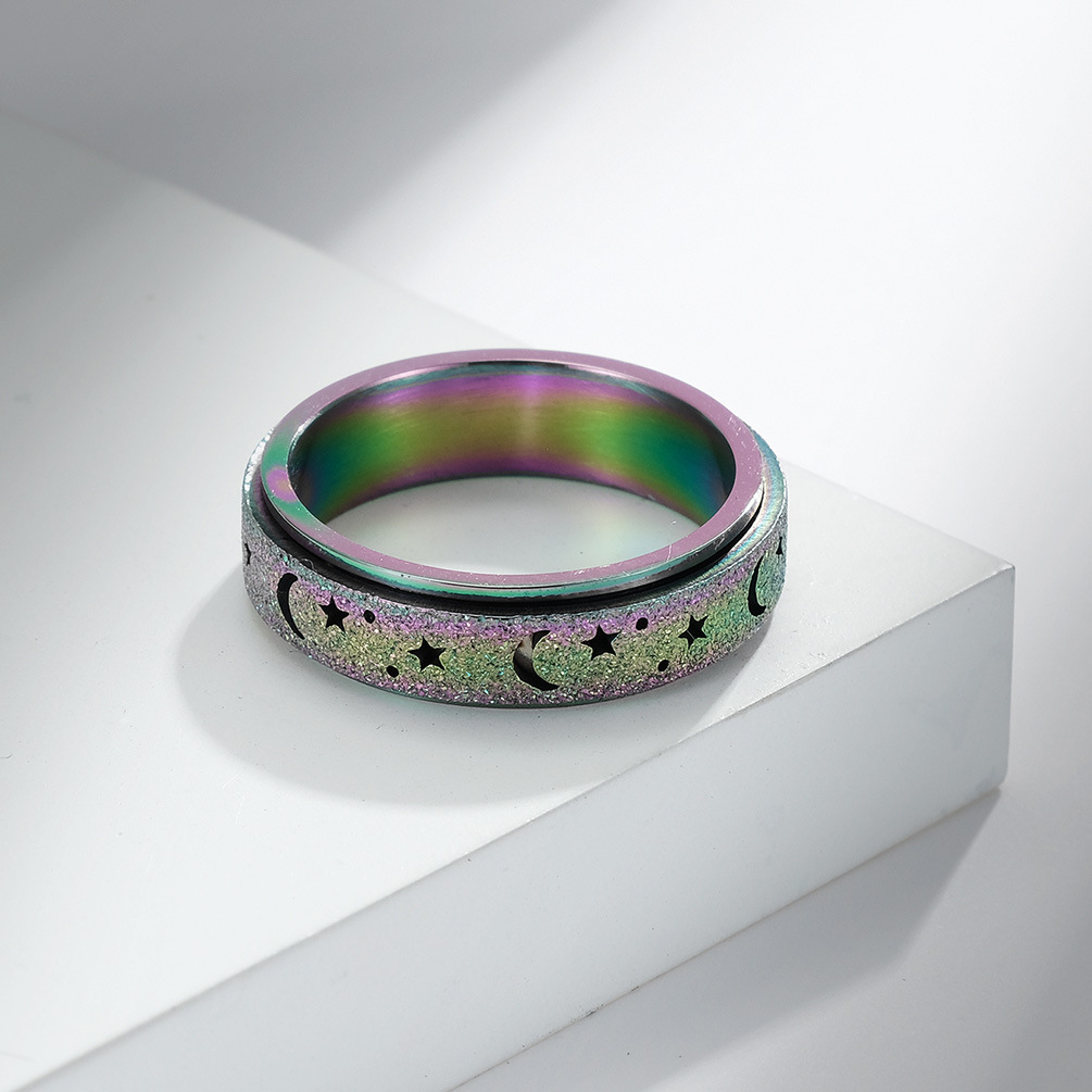Amazon Frosted Hollow estrella Luna Acero inoxidable anillo giratorio alivio estrés titanio acero anillo de las mujeres pulsera