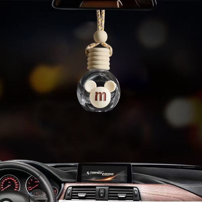 Espejo retrovisor de coche de dibujos animados botella de perfume colgante de coche botella vacía flor creativa botella de aromaterapia de coche aceite esencial decoración de coche