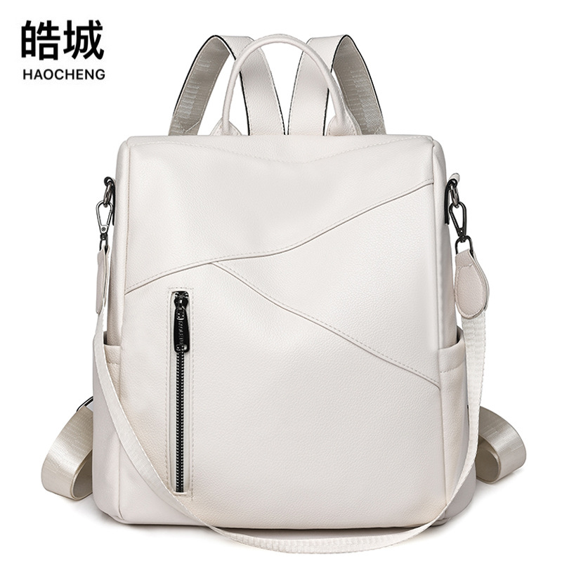 Spot al por mayor 2023 verano nueva mochila antirrobo de cuero suave para mujer coreana mochila ligera para exteriores simple y versátil