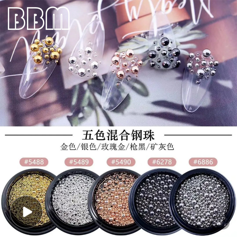 Mixed golden nail decoration for manicure