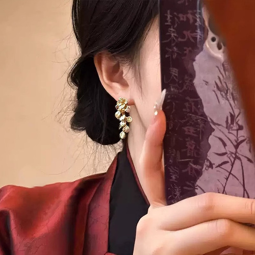 Gold-plated broken leaves ~ New Chinese style golden flower tassel earrings for women light luxury high-end style retro earrings