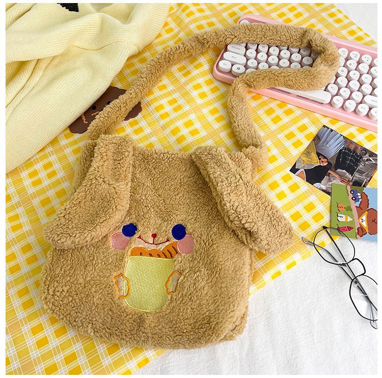 This autumn and winter hand-held bag with big ears, cute animal-embroidered fur, and a simple lambskin large-capacity student backpack undefined