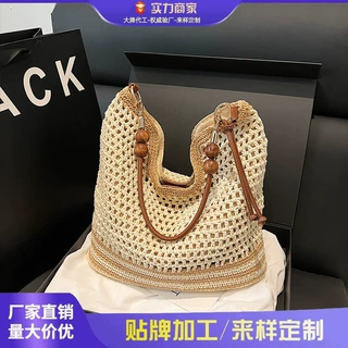 夏季时尚镂空编织包女2025新款ins简约气质单肩包大容量度假女包