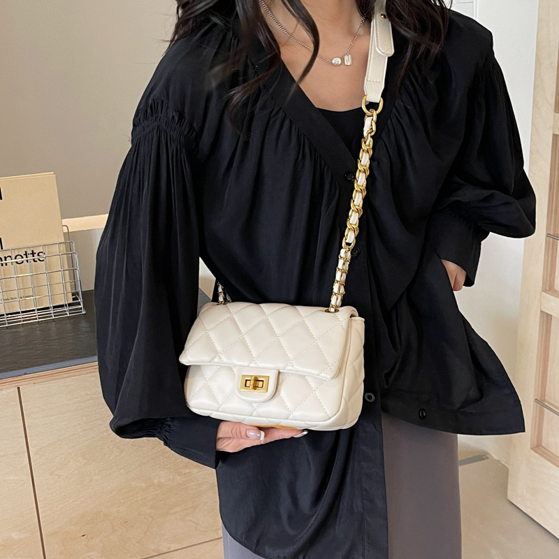 Bolsa de viento de alta calidad, dama 2024, nueva moda, bolso cuadrado de cadena de diamante, bolso de mochila de moda versátil.