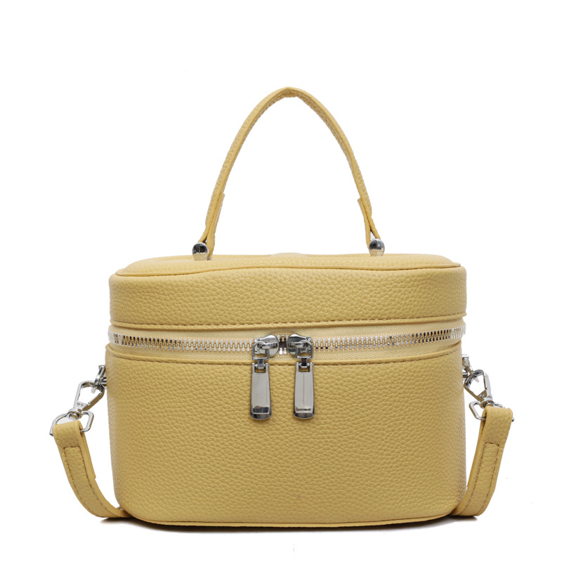 Bolso de cubo popular de este año 2025 verano nuevo bolso de hombro con patrón de lichi bolso de mensajero simple y versátil mujer