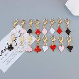 跨境热销时尚潮流黑红花片锌合金钥匙扣包包汽车挂件配件现货批发