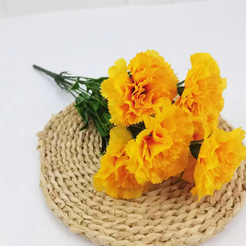 Xiaoyu Simulation Flower 7 Claveles Manlos de estilo europeo Ramo de claveles del día de la madre Paquete suave interior al por mayor