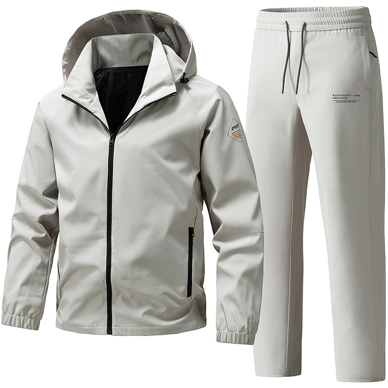 Trajes deportivos transfronterizos para hombres 2026 primavera y otoño sombrero desmontable chaqueta de asalto para hombres pantalones rectos de trabajo de dos piezas