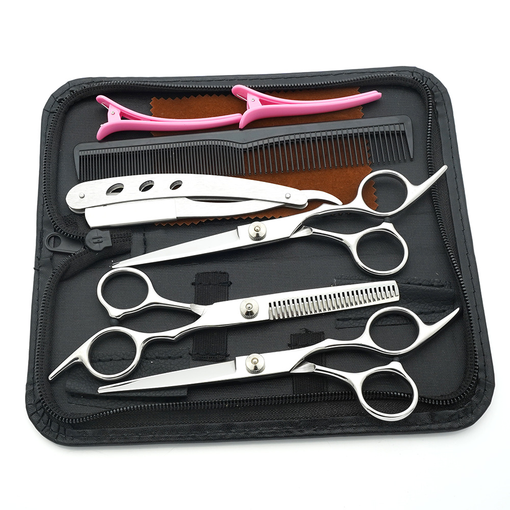Tijeras de peluquería de 6 pulgadas, negras y doradas, con mango inclinado y de alta calidad, juego de tijeras de peluquería al por mayor para cortar el cabello.
