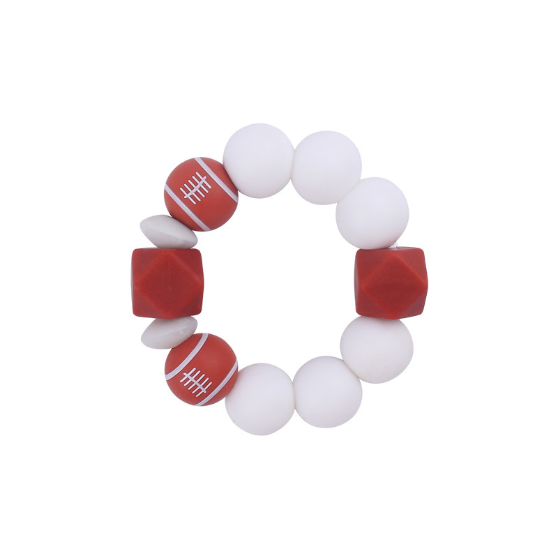 Nuevo bebé suministros de dibujos animados de fútbol de silicona impresa pulsera creativa DIY mordedura de silicona juguete de goma