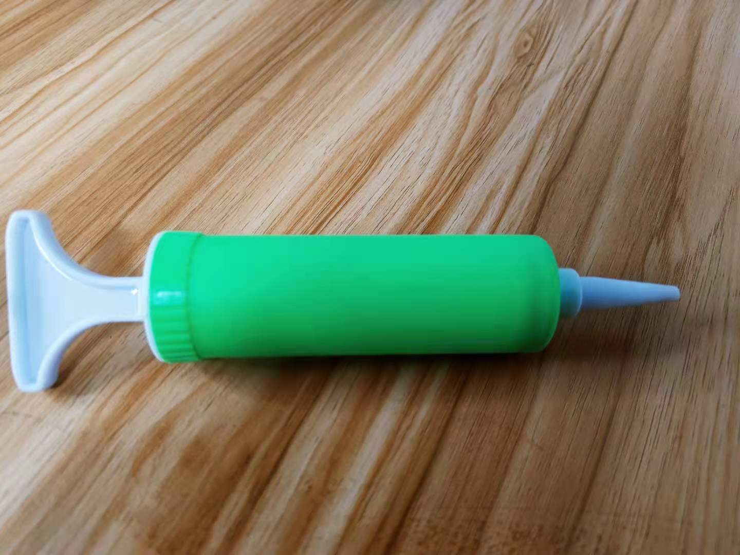 Wholesale factory price mini hand-pushed inflatable air pump, balloon inflating toy, portable pool inflating pump