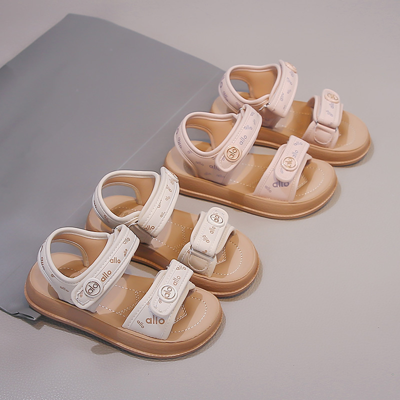 Niñas sandalias de suela suave 2026 verano nuevo niño moda versátil zapatos de playa para chicas letras zapatos Lefour zapatos
