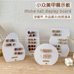 Ins風ネイル展示板小衆の新型筋理感立体背景写真撮影道具作品は見本の色板を並べます。