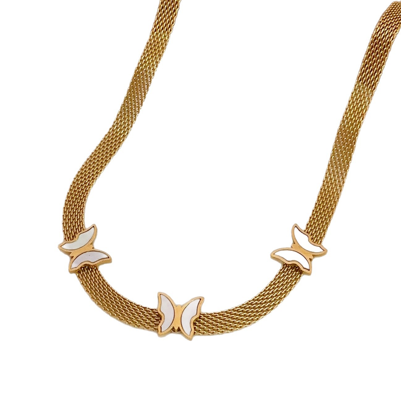 Cadena de cuchillas de venta caliente transfronteriza europea y americana mariposa concha blanca collar retro colgante tejido simple pendientes mujeres moda de lujo ligero