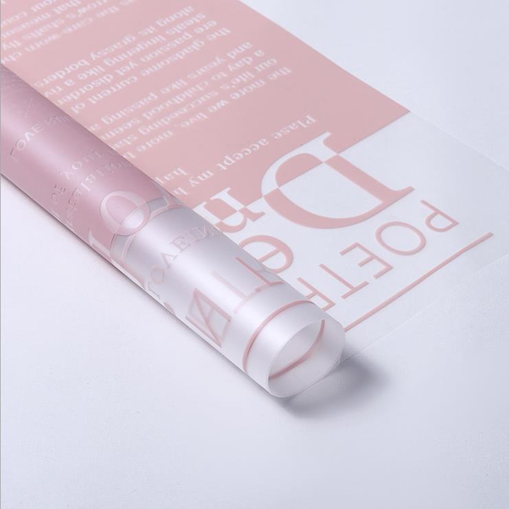 Fabricante de fiestas de flores al por mayor nuevo patrón de amor de San Valentín papel de embalaje de flores floristería translúcida ramo de flores