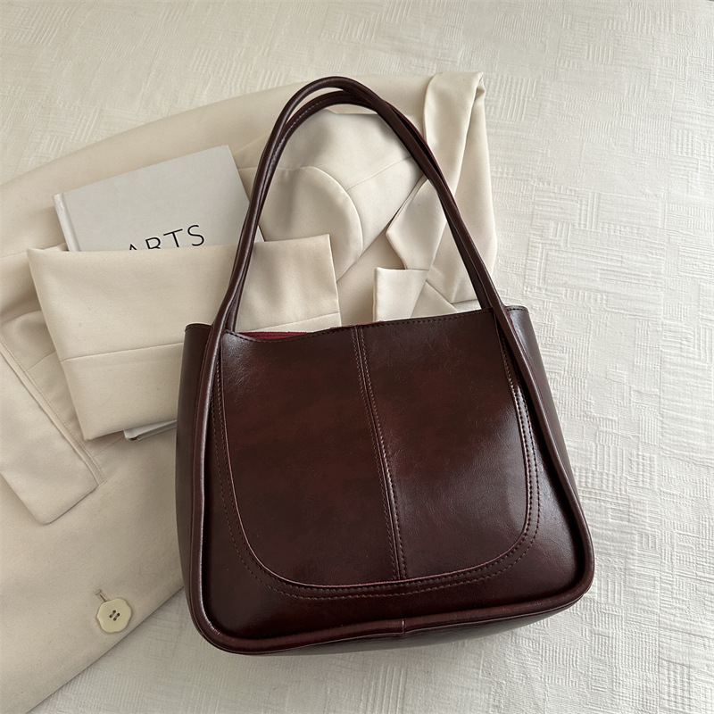 Bolsos populares para mujer 2024 otoño e invierno nuevo estilo coreano retro de gran capacidad para viajar en clase bolso de hombro bolso de moda