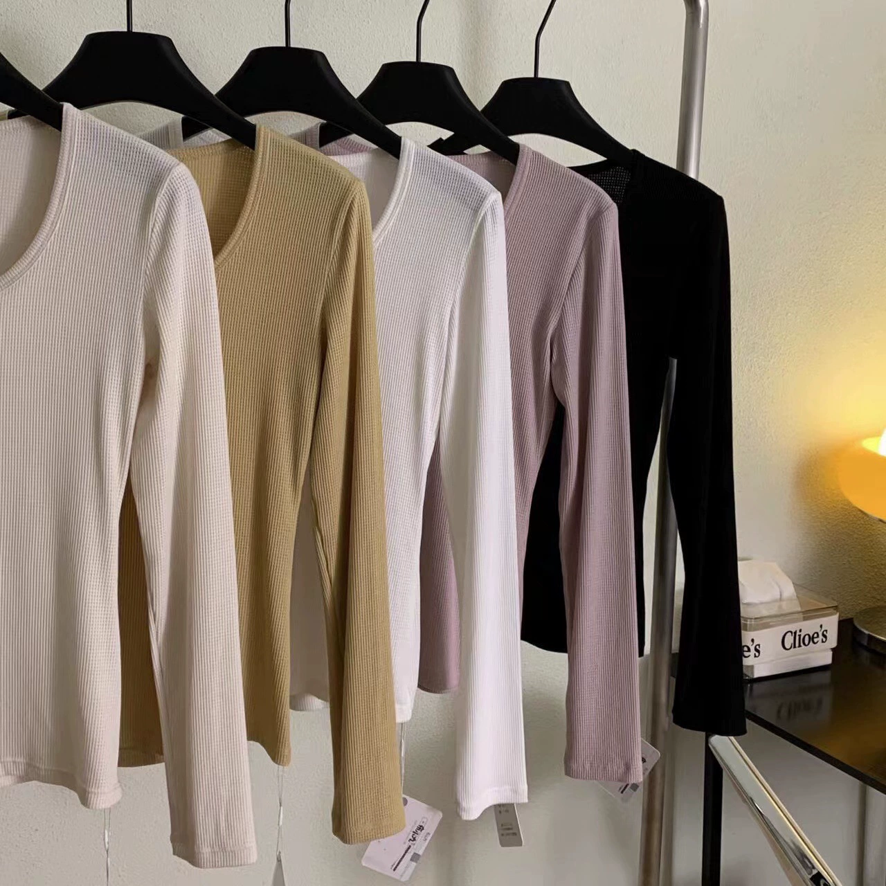 Fashionable fitted long-sleeve with a round collar, 2023 collection