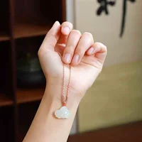 Фабрика Hetian Jade Store Ювелирные изделия из нефрита Натуральный нефрит Синьцзян Хэтиан Цинхай Материал Мясо ягненка Белый нефрит Кулон в виде кролика