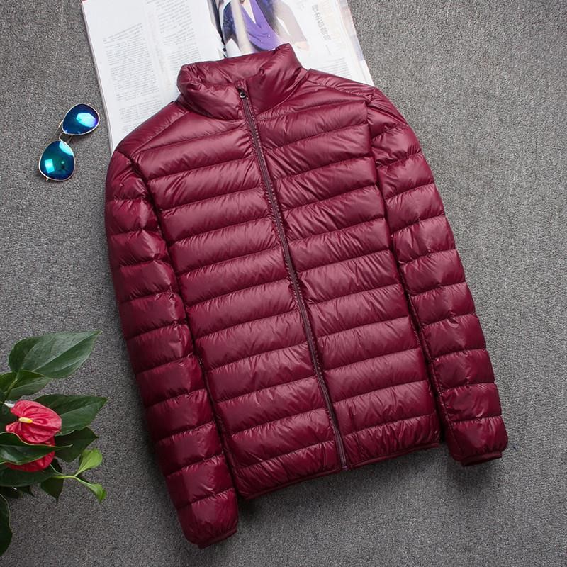Chaqueta de algodón de plumas ligera y delgada para hombre otoño e invierno 2023 Chaqueta de algodón de gran tamaño con capucha ligera y anti-temporada marca
